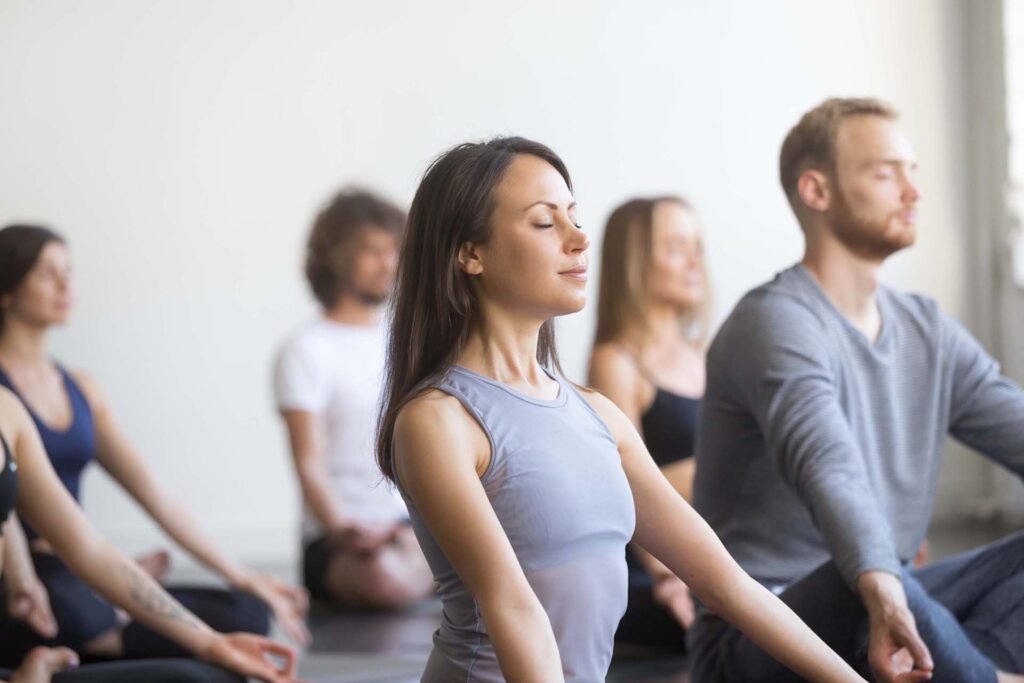 Séance personnalisé de yoga en entreprise avec un coach sportif